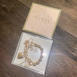 GUESS charm bracelet and heart earrings set